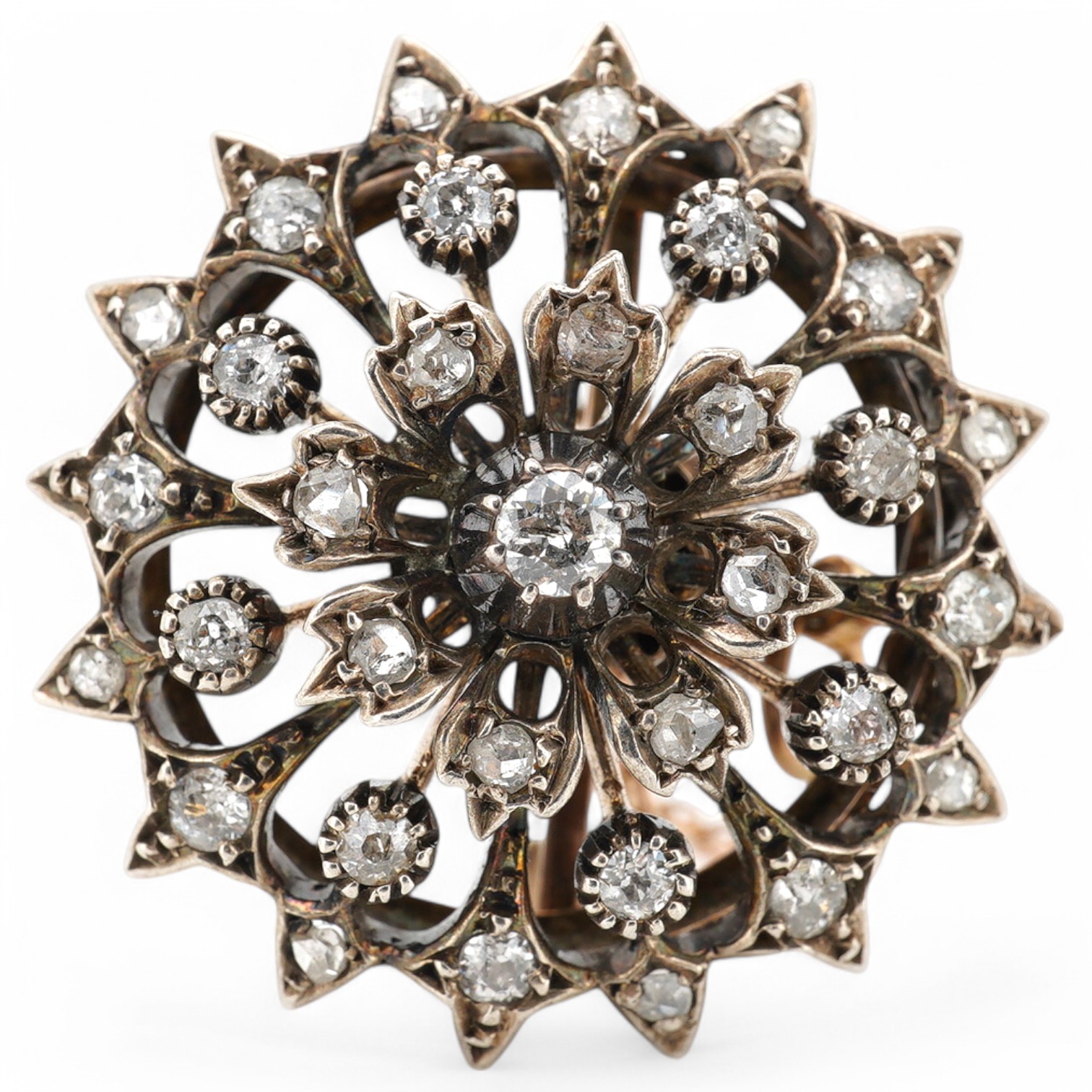 A Victorian yellow and white metal, rose and old round cut diamond set circular cluster pendant brooch, 28mm, gross weight 10.9 grams. Condition - fair to good.